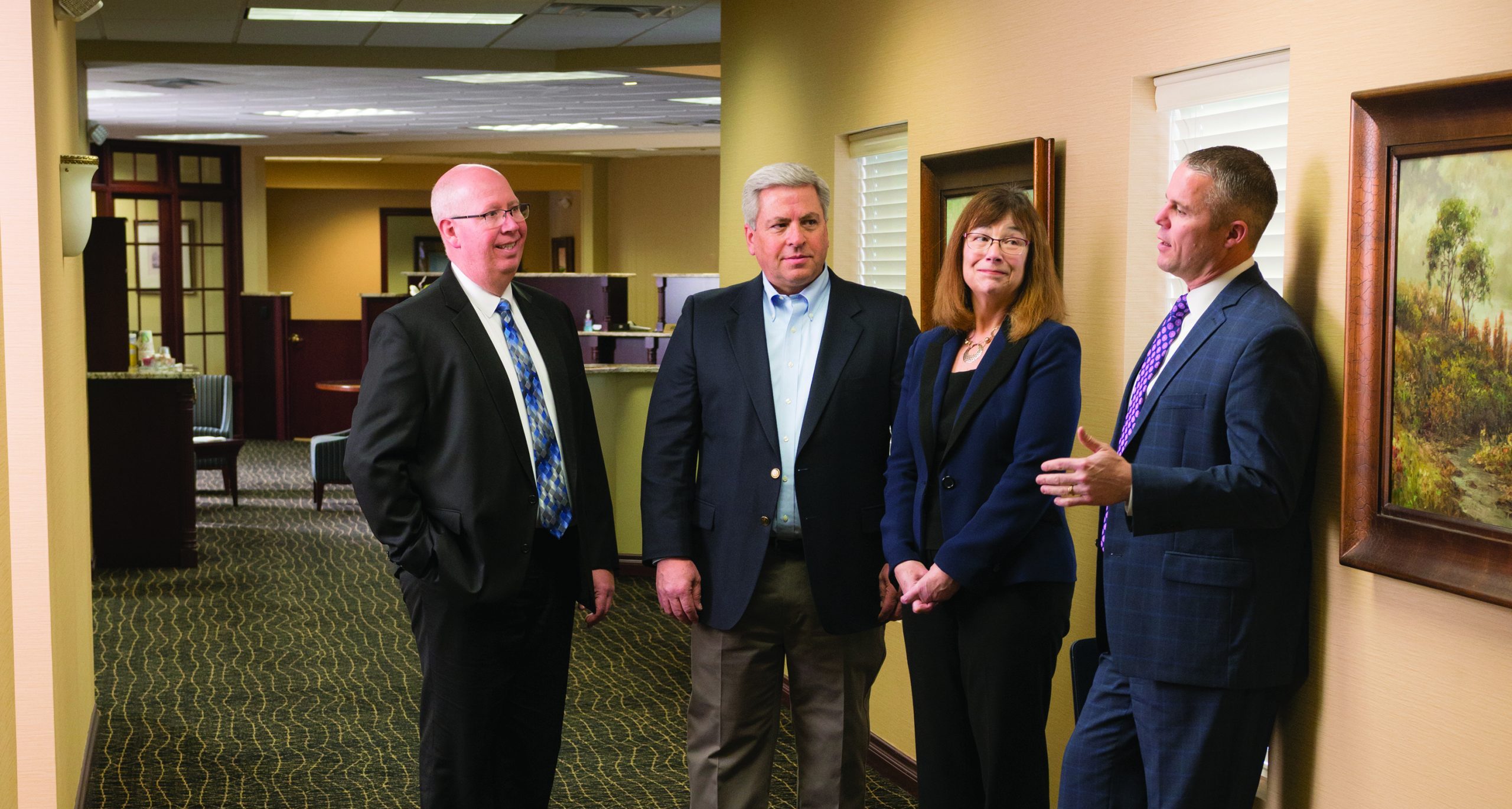 Group of Bankers discussing business opportunities.