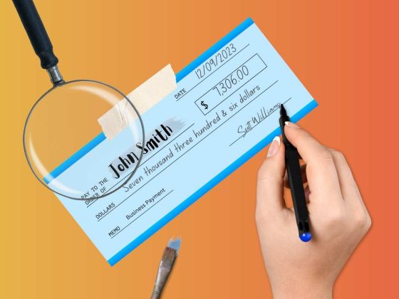 A scammer alters a paper check endorsement.