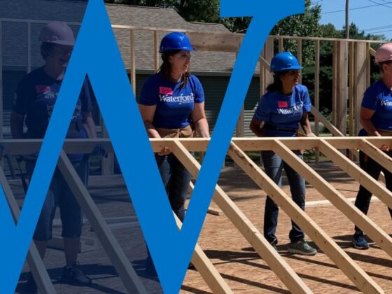 Waterford Bank builds houses for community service.
