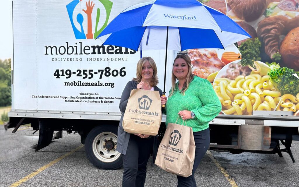 Waterford ladies perform community service delivering meals to those in need.