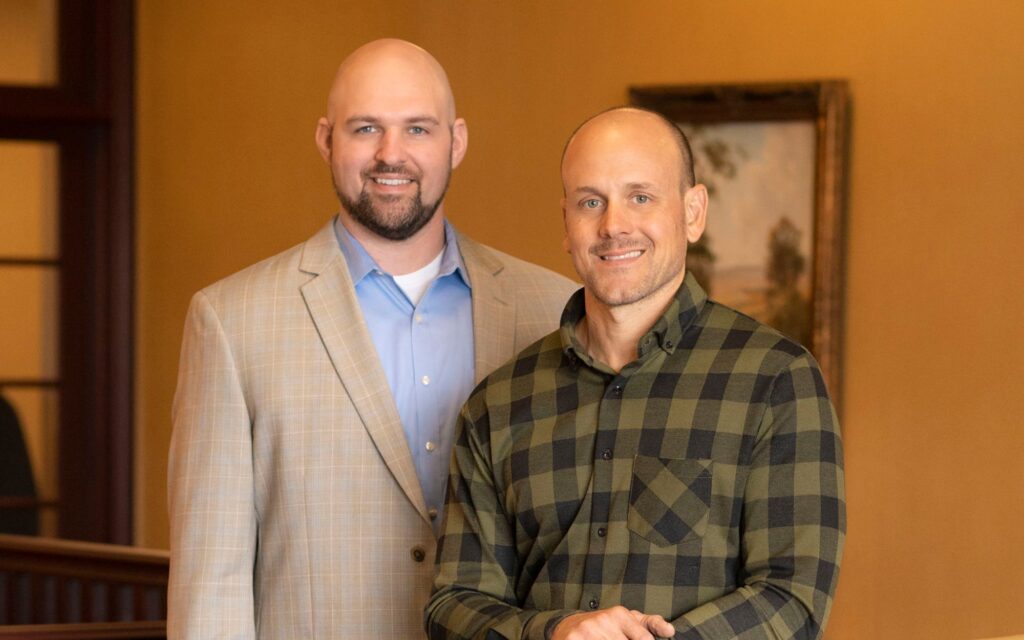 Chris Morris of Inside the Five and Matt DeWood Real Estate Developer smiling at camera.