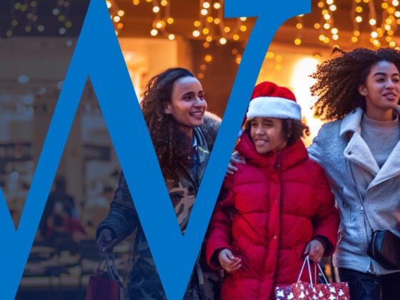 A family shops for holiday gifts.