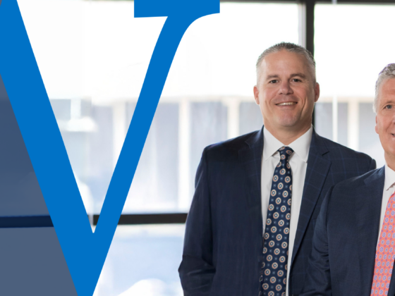 Portrait of Jeremy Zeisloft, President and Chief Lending Officer, and Mike Miller, Chairman and CEO of Waterford Bank, standing together in a professional setting.