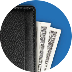 A wallet with money peaking out of it.