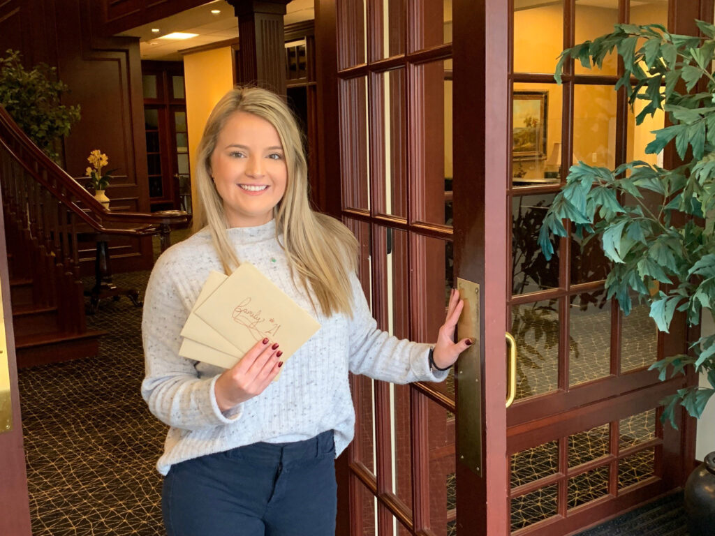 A young woman on her way into the Bank to discuss Business Banking for Young Entrepreneurs.